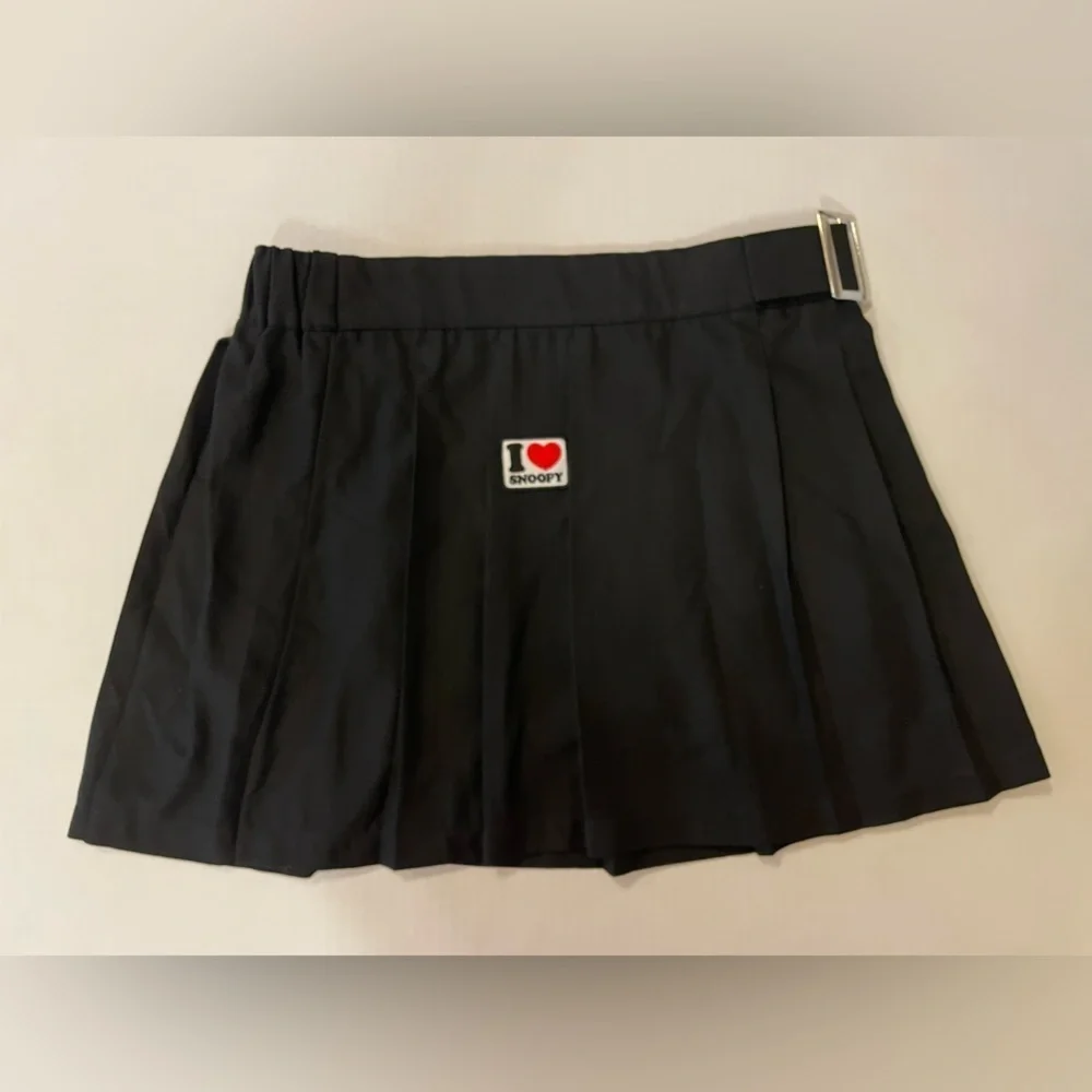 Justice Snoopy patch black pleated skort size girls XL Plus NWT